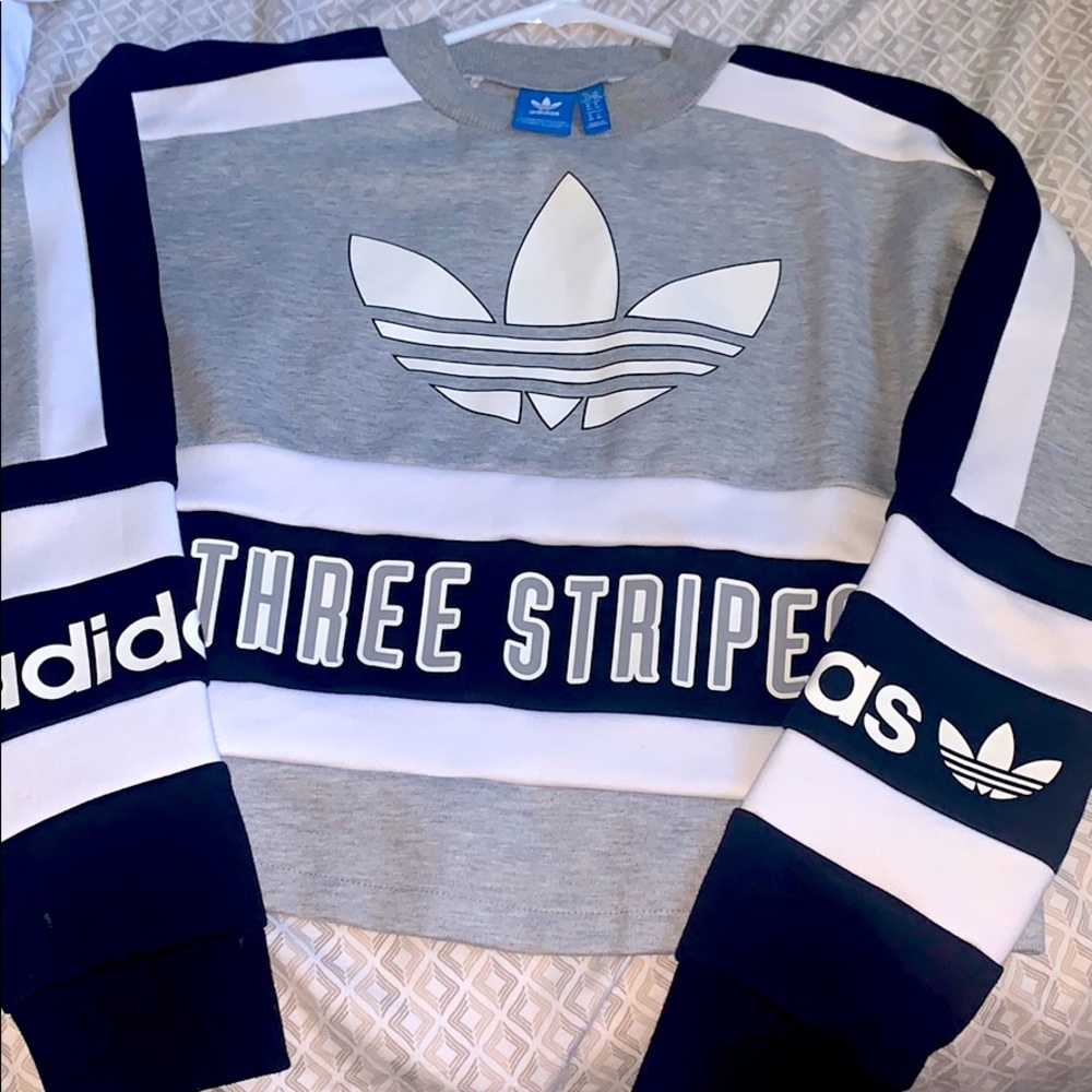 adidas “three stripes” cropped sweatshirt.